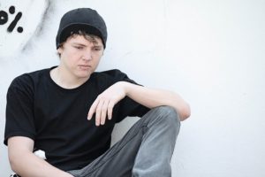 sad depressed lonely adolescent teen boy