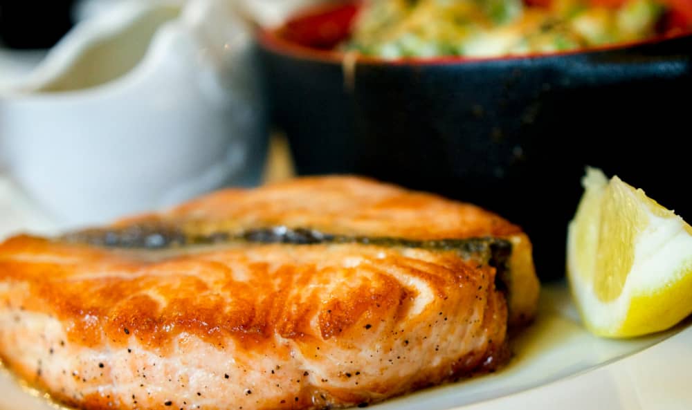 Image of salmon steak and a side to show good nutrition in alcohol rehab and recovery.