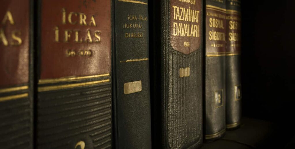 Image of law books, up close to help understanding the laws on if you can make someone go to rehab in California